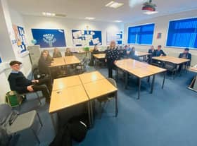 Pupils pose questions to Amy Callaghan during her visit to the school.