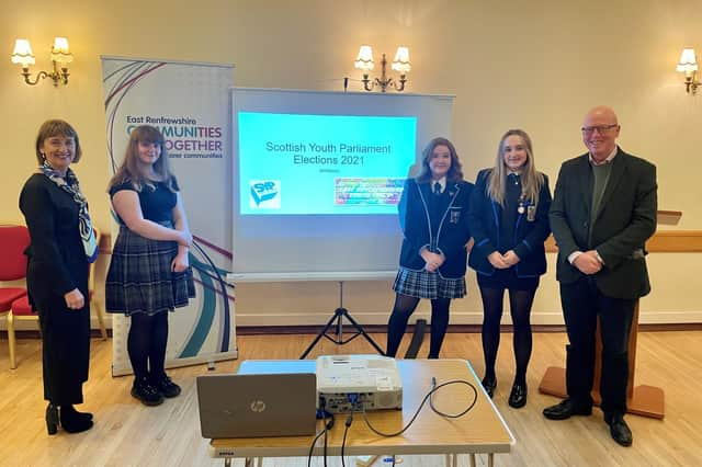 MSYPs Kym Wilson, Lily Frame and Ashley Kee flanked by returning officer Caroline Innes and Councillor Colm Merrick.