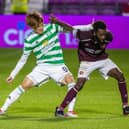 Celtic's new signing Kyogo Furuhashi (left) makes his debut as he competes with Hearts' debutant Beni Baningime during the cinch Premiership match between Hearts and Celtic at Tynecastle, on July 31, 2021. (Photo by Alan / SNS Group)
