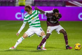 Celtic's new signing Kyogo Furuhashi (left) makes his debut as he competes with Hearts' debutant Beni Baningime during the cinch Premiership match between Hearts and Celtic at Tynecastle, on July 31, 2021. (Photo by Alan / SNS Group)