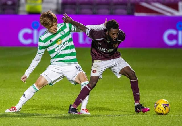 Celtic's new signing Kyogo Furuhashi (left) makes his debut as he competes with Hearts' debutant Beni Baningime during the cinch Premiership match between Hearts and Celtic at Tynecastle, on July 31, 2021. (Photo by Alan / SNS Group)