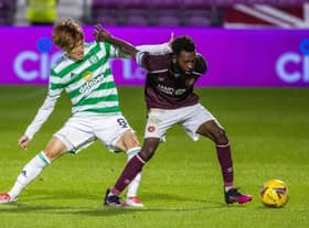 Celtic's new signing Kyogo Furuhashi (left) makes his debut as he competes with Hearts' debutant Beni Baningime during the cinch Premiership match between Hearts and Celtic at Tynecastle, on July 31, 2021. (Photo by Alan / SNS Group)