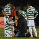 Celtic's  players show concern for Callum McGregor following the facial injury that has raised concerns of an extended period on the sidelines for the player. (Photo by Craig Foy / SNS Group)