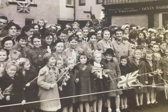 Groups of boys and girls from county schools lined the High Street, with vantage points set aside for them so that Her Majesty could see their delighted wee faces and their Union Jack flags.