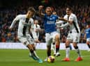 Rangers' Kemar Roofe (centre) tries to find a way through the Livingston defence.
