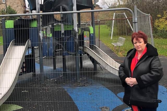 The MSP pictured at the seriously damaged playpark in Kirkintilloch