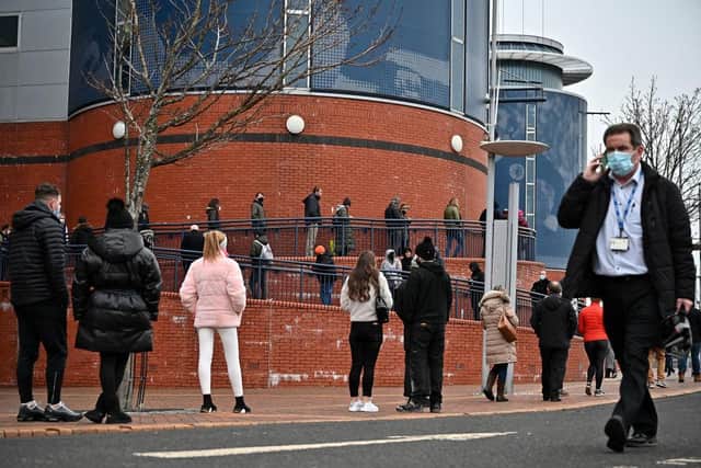 Members of the public queue to receive a Covid-19 vaccine outside Hampden Park. Picture: Jeff J Mitchell/Getty Images