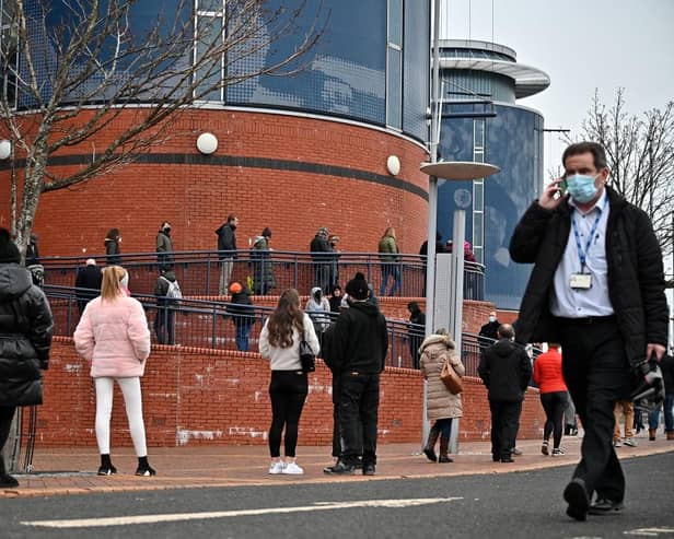 Members of the public queue to receive a Covid-19 vaccine outside Hampden Park. Picture: Jeff J Mitchell/Getty Images