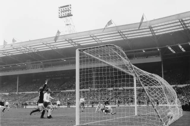 England goalkeeper Gordon Banks fails to prevent Jim McCalliog from scoring Scotland's third goal during an England V Scotland match at Wembley, London, 15th April 1967. Scotland's Billy Bremner (left) raises him arms in celebration. Scotland won 2-3. (Photo by Dennis Oulds/Central Press/Getty Images)