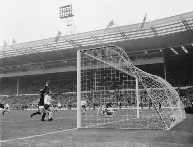 England goalkeeper Gordon Banks fails to prevent Jim McCalliog from scoring Scotland's third goal during an England V Scotland match at Wembley, London, 15th April 1967. Scotland's Billy Bremner (left) raises him arms in celebration. Scotland won 2-3. (Photo by Dennis Oulds/Central Press/Getty Images)