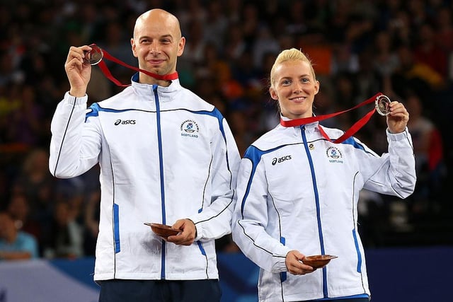 Robert Blair and Imogen Bankier of Scotland win bronze in the mixed doubles at Emirates Arena.