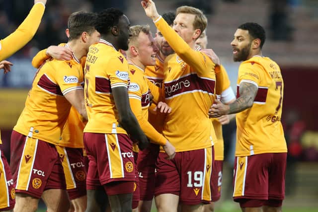 Dean Cornelius is mobbed by team-mates after scoring his first Motherwell goal (Pics by Ian McFadyen)