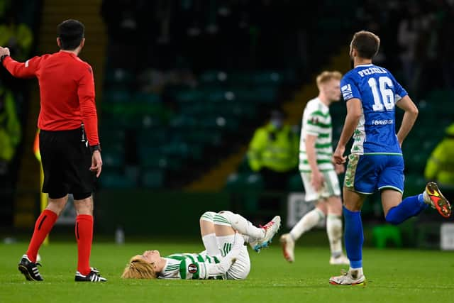 Kyogo Furuhashi lies on the turf during Celtic's 3-2 win over Betis.