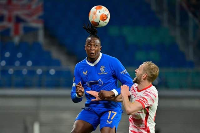 Rangers' Nigerian midfielder Joe Aribo (L) and Leipzig's Austrian midfielder Konrad Laimer both jump to head the ball during the UEFA Europa League semi-final, first leg - Kenny Miller believes Aribo is an option up front for the second leg at Ibrox. (Photo by JOHN MACDOUGALL/AFP via Getty Images)