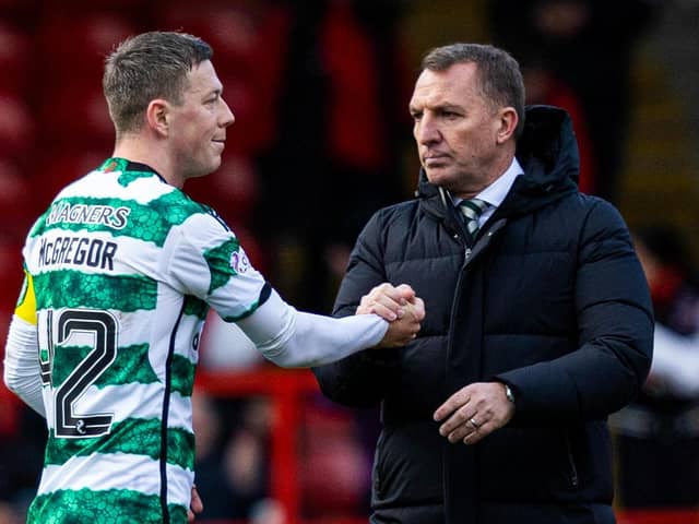 Celtic's Callum McGregor shakes hands with Brendan Rodgers