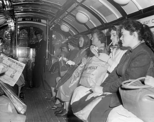 Glaswegians going home on the subway after a day's shopping in 1962.