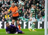 Dundee United goalkeeper Mark Birighitti can only watch as Sead Haksabanovic's shot creeps over the line in the 4-2 defeat to Celtic.  (Photo by Craig Foy / SNS Group)