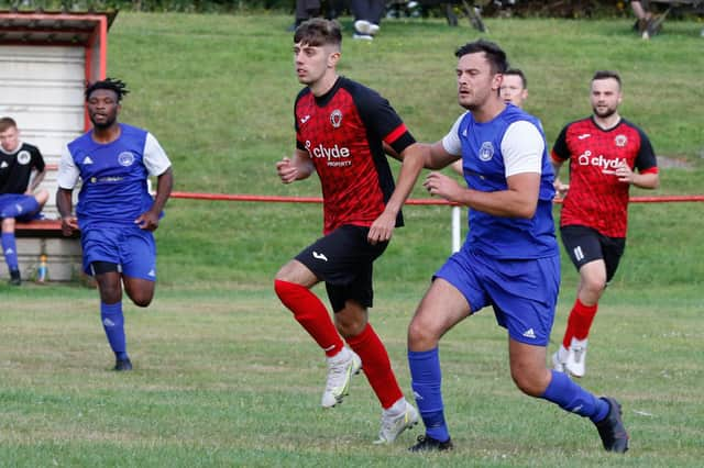 Thorniewood United (in red strips) have been joined in next round by Bellshill Athletic (Library pic by Kevin Ramage)