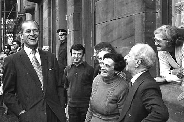 A natural shot of the Duke of Edinburgh talking to council house tenants in Rutherglen in October 1976. Rodger still bears the scars after getting in a bit too close!