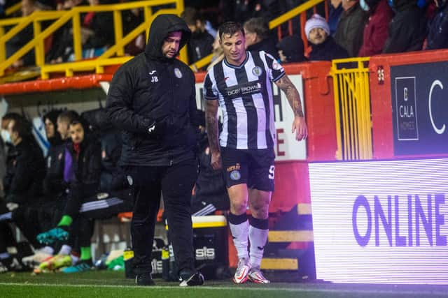 Eamonn Brophy comes off injured during a cinch Premiership match between Aberdeen and St Mirren.