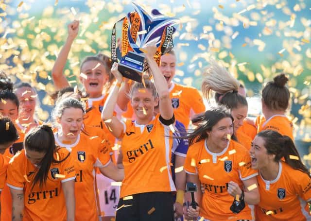 Leanne Ross of Glasgow City lifts the SWPL title during a Scottish Women's Premier League match between Glasgow City and Rangers at Broadwood Stadium on June 06, 2021, in Cumbernauld, Scotland (Photo by Mark Scates / SNS Group)