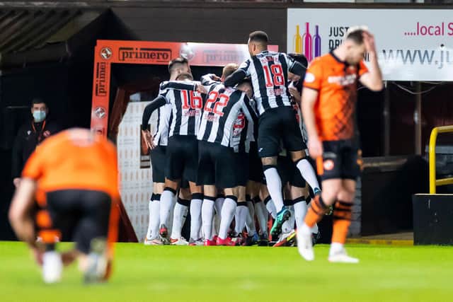 St Mirren players celebrate after Jay Henderson put his side 1-0 up at Dundee United. (Photo by Roddy Scott / SNS Group)