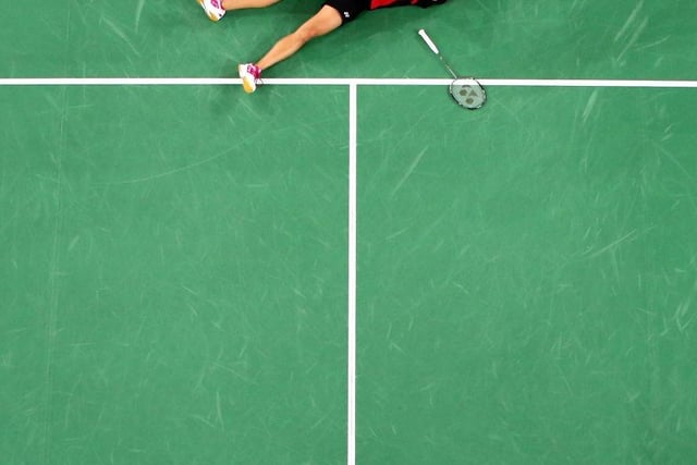Michelle Li of Canada celebrates victory in the Women's Singles Gold Medal Match against Kirsty Gilmour of Scotland at Emirates Arena during day eleven of the Glasgow 2014 Commonwealth Games on August 3, 2014.