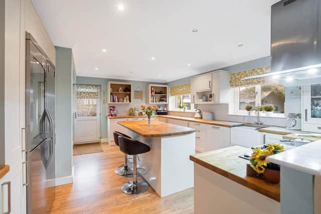 This stunning kitchen typifies the standard of rooms throughout this wonderful family home