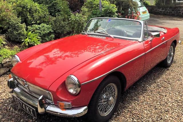 This 1963 MGB Roadster oozes style and sophistication. I'm sold!