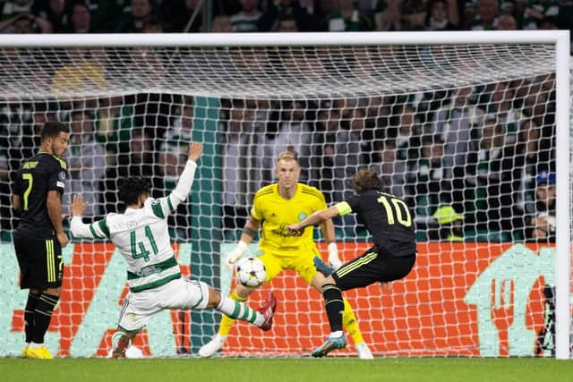 Real Madrid’s Luka Modric nets with a sublime finish in the 3-0 win over Celtic in a week that witnessed Scotland's European representatives concede 11 goals without reply as a result of heavy subsequent defeats for Rangers and Hearts. (Photo by Craig Williamson / SNS Group)