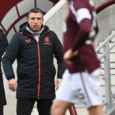 Rangers manager Giovanni van Bronckhorst and assistant Roy Makaay at Tynecastle.