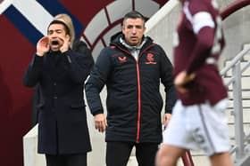Rangers manager Giovanni van Bronckhorst and assistant Roy Makaay at Tynecastle.