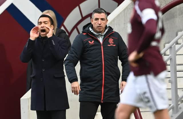 Rangers manager Giovanni van Bronckhorst and assistant Roy Makaay at Tynecastle.