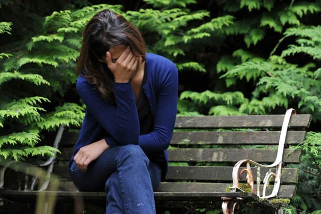 PICTURE POSED BY MODEL File photo dated 31/07/14 of a woman showing signs of depression. Free legal advice aimed at helping tens of thousands of people each year who are at risk of losing their homes has been welcomed by an organisation representing housing associations. Issue date: Tuesday August 1, 2023.