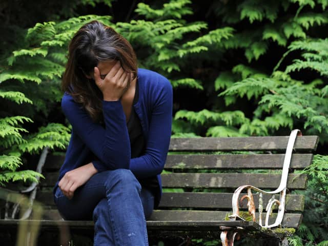 PICTURE POSED BY MODEL File photo dated 31/07/14 of a woman showing signs of depression. Free legal advice aimed at helping tens of thousands of people each year who are at risk of losing their homes has been welcomed by an organisation representing housing associations. Issue date: Tuesday August 1, 2023.