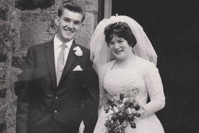 Happy couple on their wedding day, August 3, 1963.