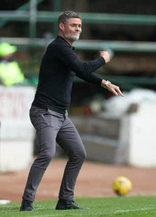 Watching Sunday's draw in Perth had its emotional ups and downs for Motherwell boss Graham Alexander (Pic by Ian McFadyen)