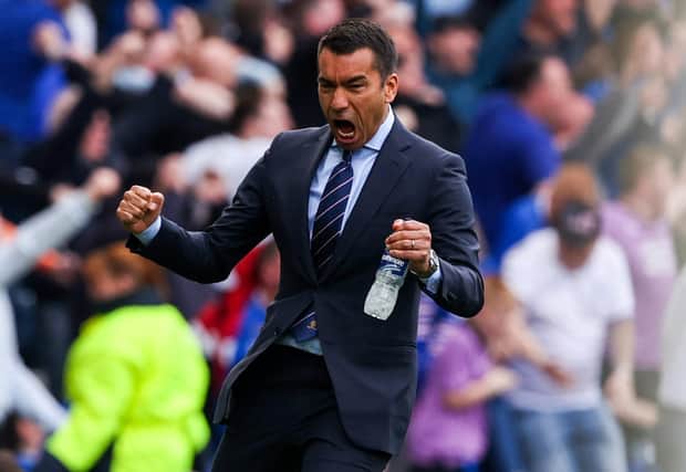Rangers manager Giovanni van Bronckhorst celebrates his side taking the lead in extra time against Celtic.