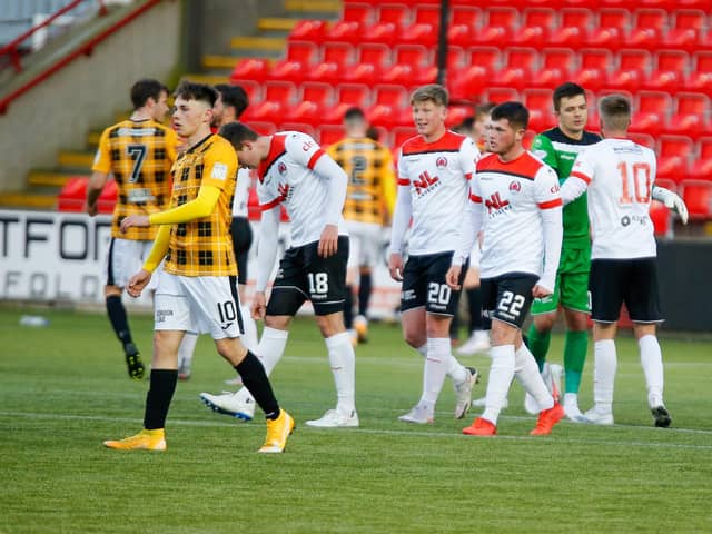 Clyde players after beating East Fife to avoid relegation from League 1 (pic: Craig Black Photography)