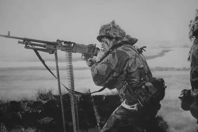 Drum Major Willie Urban, now 65, from Newtongrange, Midlothian, who joined the Scots Guards when he left school as he "didn't want to go in the pits" like his father. Here's he is pictured firing his machine gun during the 1982 war.