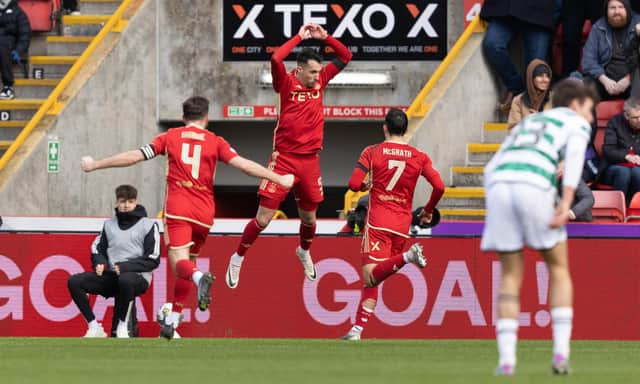 Aberdeen's Bojan Miovski celebrates after opening the scoring against Celtic.