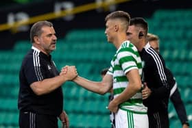 Ange Postecoglou with Dane Murray during the Champions League qualifier between Celtic and FC Midtjylland at Celtic Park