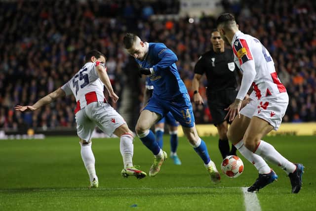 Rangers winger Ryan Kent is brought down by Slavoljub Srnic of Red Star Belgrade for the VAR-awarded penalty kick which opened the scoring for the Scottish champions in their 3-0 win at Ibrox last week. (Photo by Ian MacNicol/Getty Images)