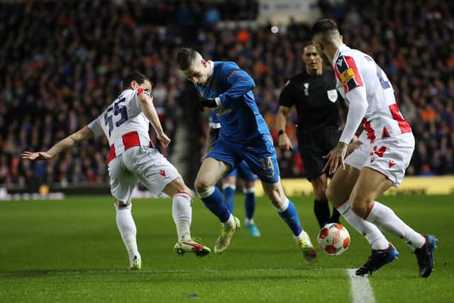 Rangers winger Ryan Kent is brought down by Slavoljub Srnic of Red Star Belgrade for the VAR-awarded penalty kick which opened the scoring for the Scottish champions in their 3-0 win at Ibrox last week. (Photo by Ian MacNicol/Getty Images)