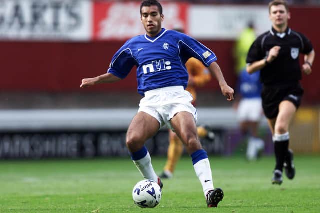 Van Bronckhorst played more than 110 times for Rangers. Picture: SNS