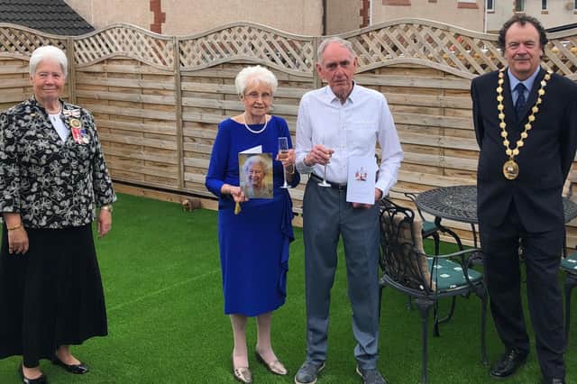 Chrissie and Joe Collins were visited by Provost Alan Brown and depute Lord Lieutenant Dr Gill Aitkenhead at they celebrated their 60th wedding anniversary