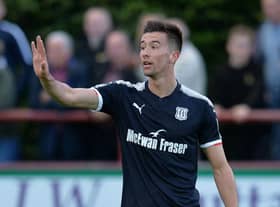 Defender Kerr spent three years with Hartley at Dundee where he has remained since along with two loan spells at Peterhead. Kerr can operate at either fullback position and would provide competition for places at the Suit Direct Stadium. (Photo by Mark Runnacles/Getty Images)