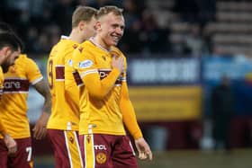Dean Cornelius celebrates his opening goal in Motherwell's 2-0 win over St Johnstone at Fir Park