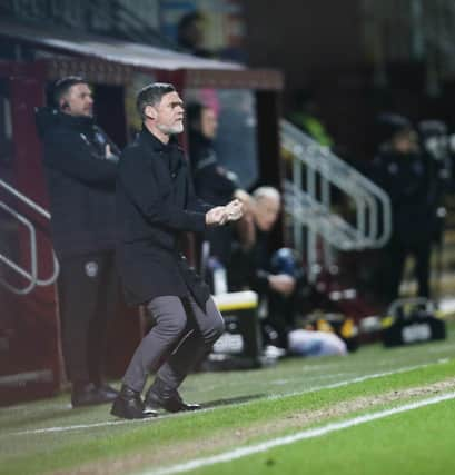 Graham Alexander watches 1-0 defeat to Ross County (Pic by Ian McFadyen)