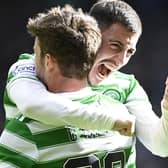 Substitute Matt O'Riley (L) celebrates making it 6-0 with Josip Juranovic. (Photo by Rob Casey / SNS Group)
